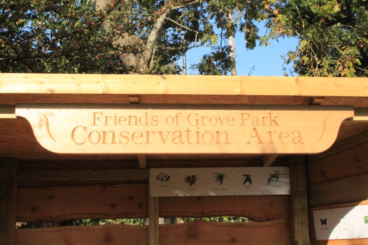 The Carved wooden sign